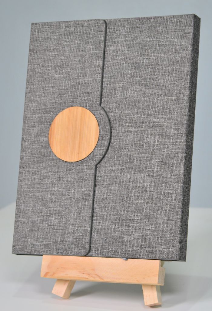 project-01-b Stylish grey fabric folder with wooden accent on a small easel, perfect for modern office settings.